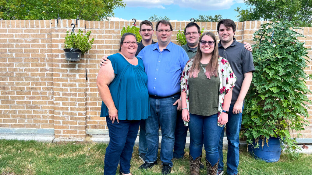 Stacey Sansom with her family | R to L: Stacey, Lance, Ben, Kyle, Kate, and Andrew