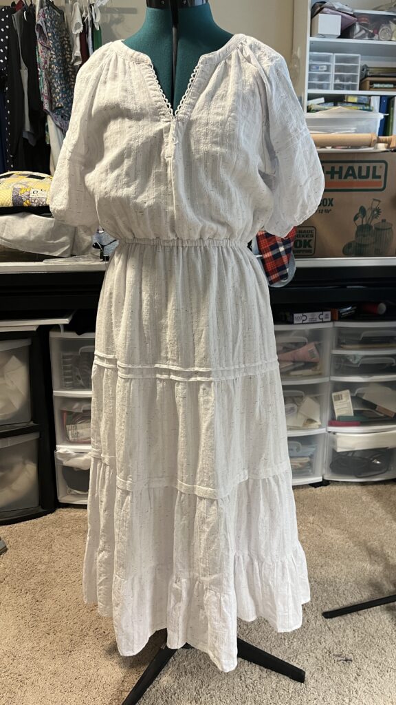 This dress is baggy from the waist up. It is also too low cut in front. | Alterations | September 2025 Progress Report | Services Provided | Stacey Sansom Designs