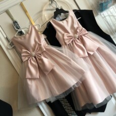 Alterations on matching flower girl dresses, both dresses started the same size and both were reduced to match the children's sizes Alterations at Stacey Sansom Designs